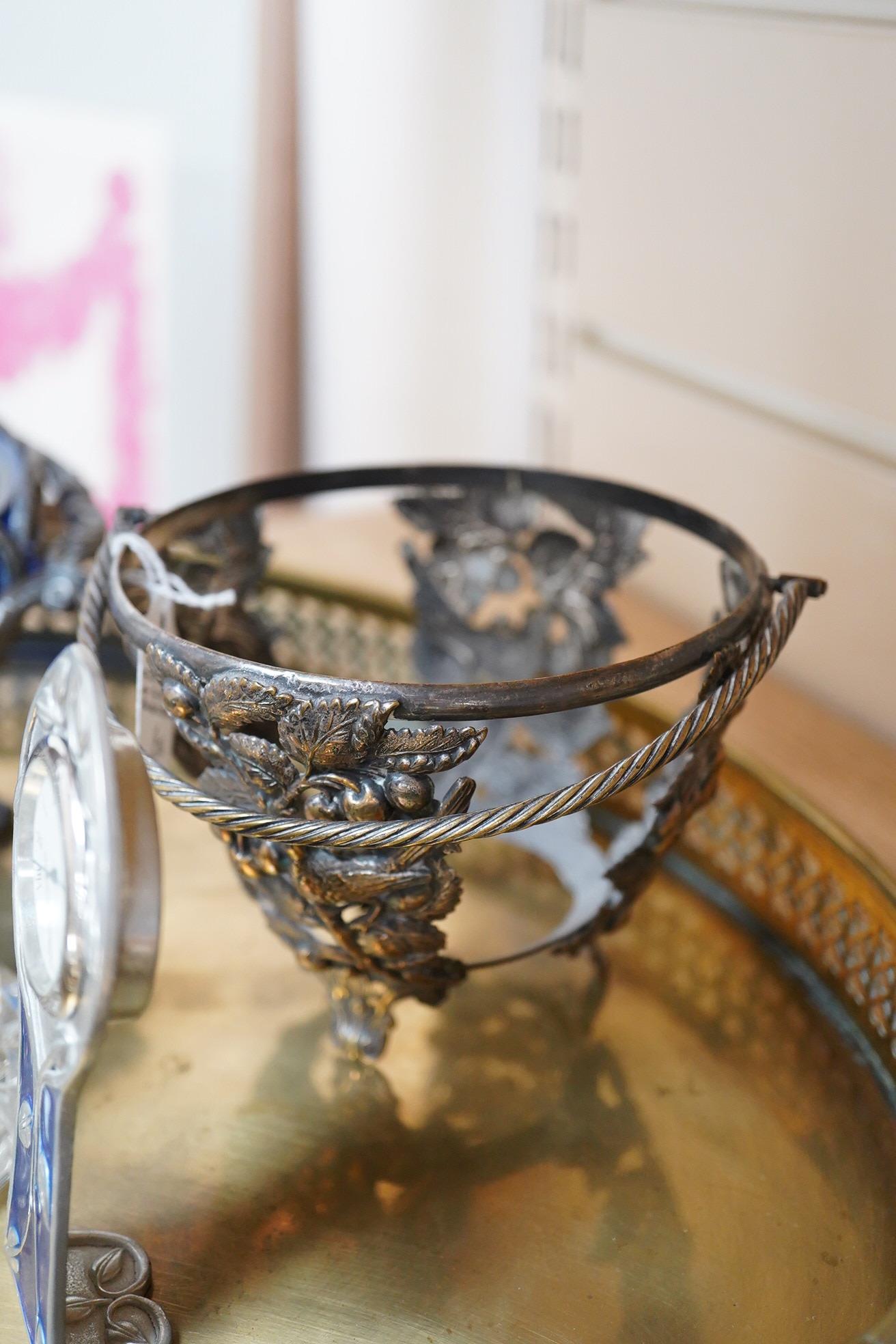An Art Nouveau style enamelled timepiece by A. E. Williams, a small group of various plated wares and some small silver